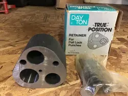 PUNCH RETAINER WITH