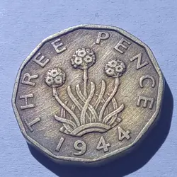 U.K. THREE PENCE