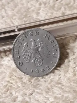 HEAVILY CIRCULATED COIN