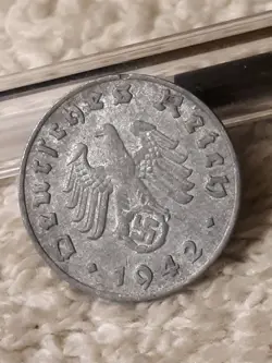 HEAVILY CIRCULATED COIN