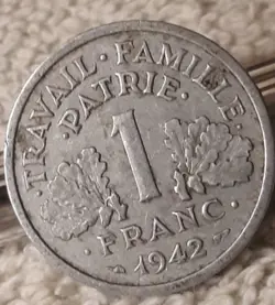 1942 1 FRANC WW2 FRANCE , HEAVILY CIRCULATED FRENCH COIN WITH FLAWS
