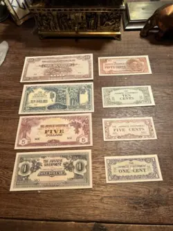 LOT OF 8 WW2 JAPANESE OCCUPATION OF MALAYA CURRENCY NOTES. UNC GEM QUALITY NOTES