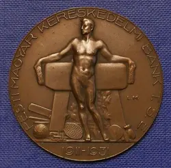 HALF-NUDE