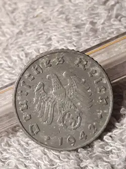 DAMAGED GERMAN REICHSPFENNIG