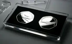 PAIR OF SPITFIRE COMMEMORATIVES IN 50P COIN DISPLAY CASE. BATTLE OF BRITAIN WW2