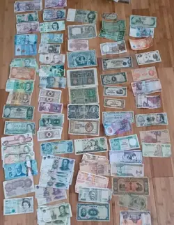 100 MIXED VINTAGE CURRENCY NOTES. MAN WW2 ERA