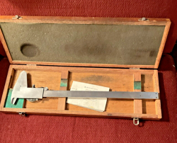 DIAL CALIPER AND