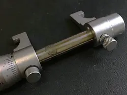 CALIPER-SHAPED