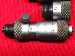 WITH 0.01MM