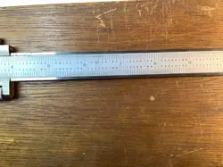 CALIPER FINE ADJUSTMENT