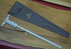 ADJUSTMENT WITH HOLDER
