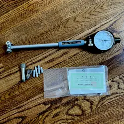 VINTAGE MITUTUYO DIAL BORE GAUGE WITH ORIGINAL PAPERWORK