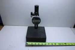 USED MITUTOYO 543-252 MODEL ID-C112E GAGE WITH GRANITE PLATE