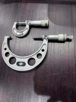 103-217 MITUTOYO MICROMETER, .0001, CARBIDE TIP, RATCHET, LOCK, USED, STAINED