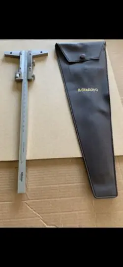 MITUTOYO METRIC VERNIER DEPTH GAGE . MEASURES DEPTH TO 200 MM
