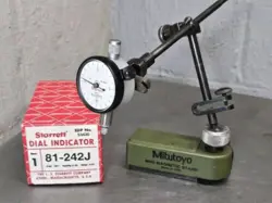 STARRETT NO. 81-242J DIAL INDICATOR WITH A MITUTOYO NO. 7025 MINI MAGNETIC BASE