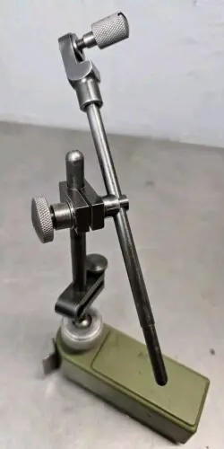 7025