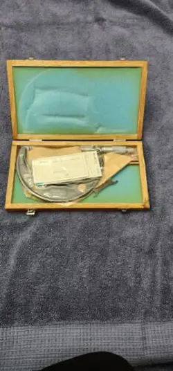 MITUTOYO 4-5 OUTSIDE MICROMETER .001 NEW OPEN BOX. TOOL IS STILL SEALED IN WRAP.