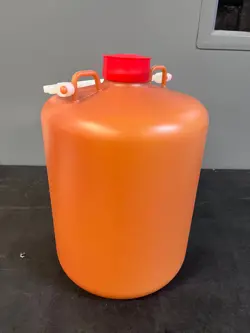 10 LITER ORANGE BOTTLE WITH HANDLE, HDPE, ENTEGRIS NOWPAK