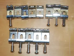 13 EACH FENDER VINTAGE STYLE STRAT BRIDGE SADDLES, NO COMPLETE SETS, SHIPPED!