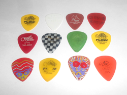 16 GUITAR PICKS. VARIOUS SIZES AND TYPE, SOME NEW- SOME USED