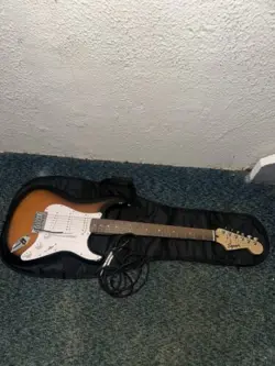 Squire By Fender Electric Guitar I Have Only Used It Twice Its Still Brand New!!