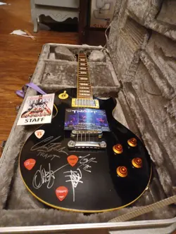 AUTOGRAPHED BY TRAPT