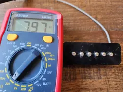 UP. 7.97 OHMS.