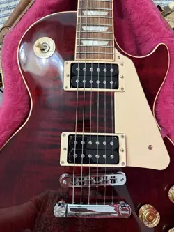 IN WINE RED.