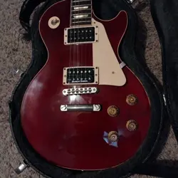 WINE RED GUITAR.
