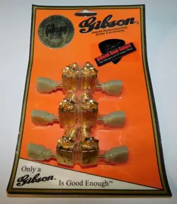 DELUXE GOLD GUITAR