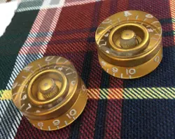 TWO GOLD GIBSON