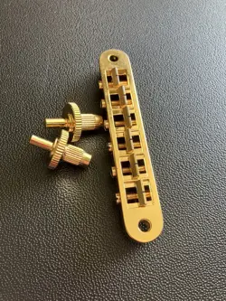 GIBSON USA NASHVILLE TUNE O MATIC BRIDGE AND STUDS GOLD