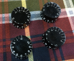 OF FOUR BLACK