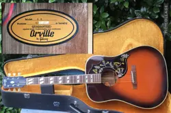 ELECTRIC ACOUSTIC GUITAR ORVILLE BY GIBSON HUMMINGBIRD MODEL SUNBURST WITH CASE