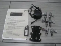 GIBSON TRONICAL 6 TUNERS G FORCE E TUNE & BATTERY , CHARGER .