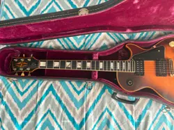 SUNBURST PIECE NECK