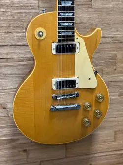 GIBSON LES PAUL DELUXE GUITAR 1977 NATURAL 9LBS 10OZ W/GEN 2 CHAINSAW CASE-CLEAN