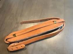 REISSUE LEATHER GUITAR