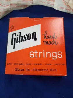 6  GIBSON ELECTRIC ACOUSTIC GUITAR MONA-STEEL STRINGS E OR 6TH WOUND 1950S BX