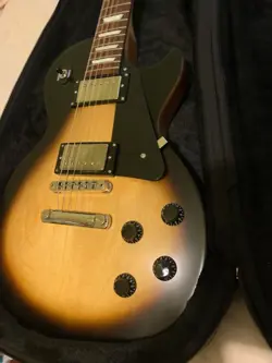 GIBSON LES PAUL TRIBUTE 2022 MINT, UNPLAYED- TOBACCO SUNBURST WITH ORIGINAL CASE