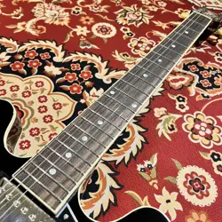ACOUSTIC GUITAR REVISED