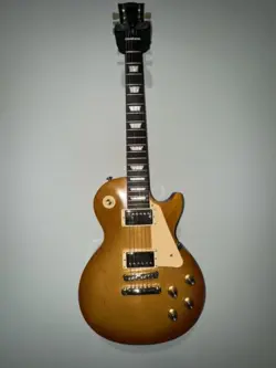 2017 GIBSON LES PAUL TRIBUTE ELECTRIC GUITAR, HONEY BURST (MINT)