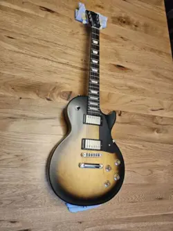 2021 GIBSON LES PAUL TRIBUTE TOBACCO BURST WITH BLACK GIBSON HARDWARE
