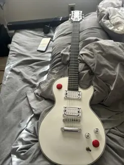 COMES WITH CASE TOO HARD SHELL   BUCKET HEAD BRAND GUITAR