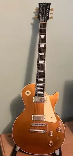 GIBSON LES PAUL DELUXE - GOLD TOP WITH HARD CASE AND GFORCE AUTO TUNING
