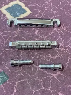 1981 GIBSON SONEX-180 DELUXE BRIDGE AND TAILPIECE
