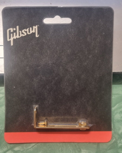 GIBSON SCRATCH PLATE BRACKET GOLD STILL IN PACKET UNOPENED BRAND NEW