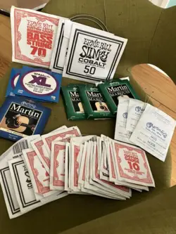 LOT OF 50  GUITAR STRINGS - ACOUSTIC, ELECTRIC, MARTIN,GIBSON,D'ADDARIO, BALL