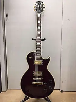 ORVILLE BY GIBSON ELECTRIC GUITAR  LES PAUL CUSTOM WINERED USED WITH GIGBAG